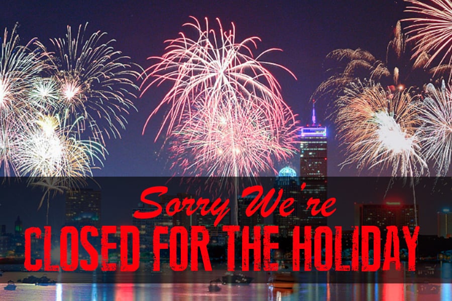 Fireworks background in Boston with a black banner at the bottoms which says "Sorry We're Closed for the Holiday" in red letters