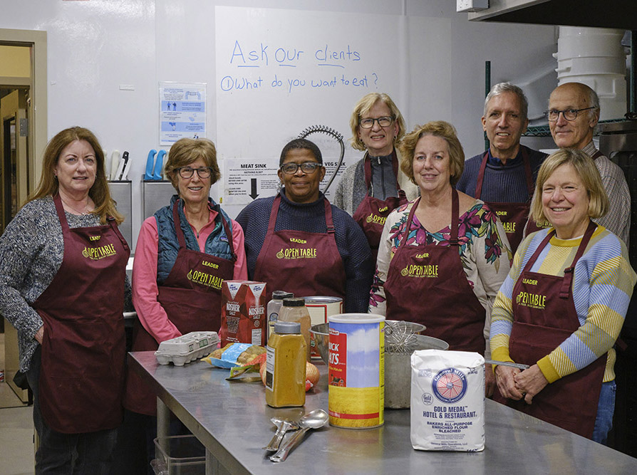 Members of the Board in the Open Table kitchen in November 2022