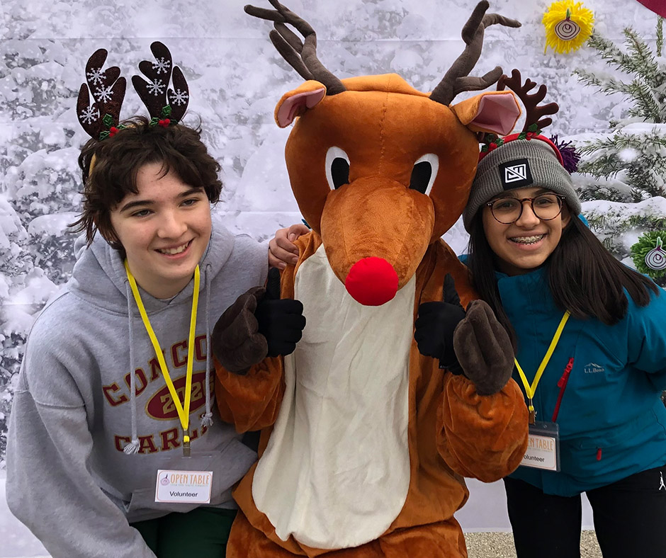 Rudolph at Open Table's booth at the Concord Tree Lighting