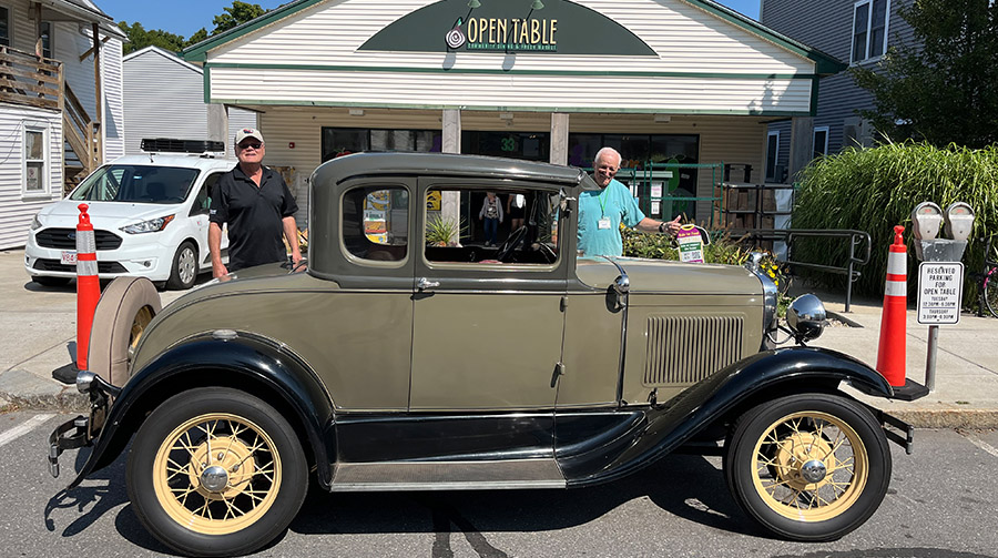 Volunteers Dick Krug and Hal Nichols deliver vintage-style