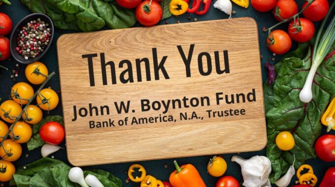Cutting Board surrounded by fresh produce with black letters saying "Thank you John W. Boynton Fund, Bank of America, N.A, Trustee